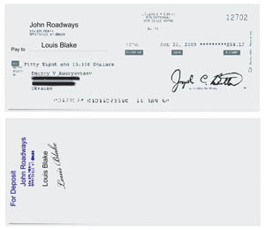 An endorsed signature with stamp behind the check