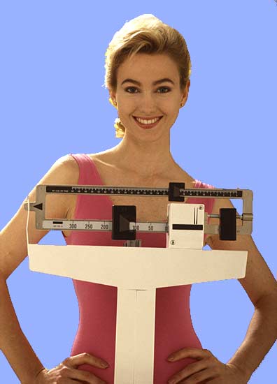 Image of a person weighing themselves on a scale    