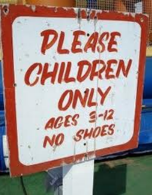 sign that says Please Children Only Ages 3 through 12 No Shoes