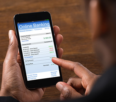 man using an online banking app