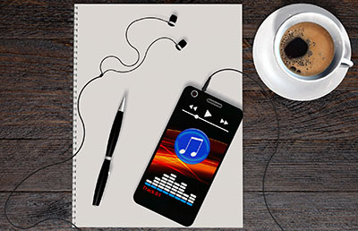A smart phone with earbuds plugged into it