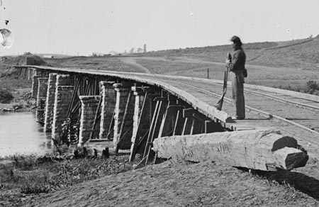 Union soldier guarding a bridge