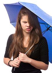 angry girl holding umbrella