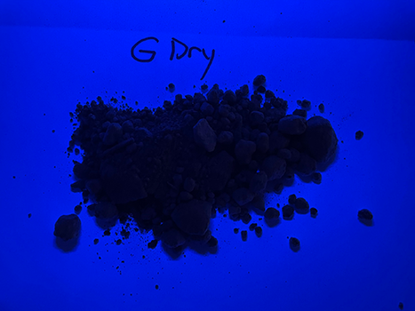 Soil under UV light labelled G - Dry