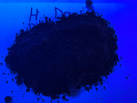 Soil under UV light labelled H - Dry