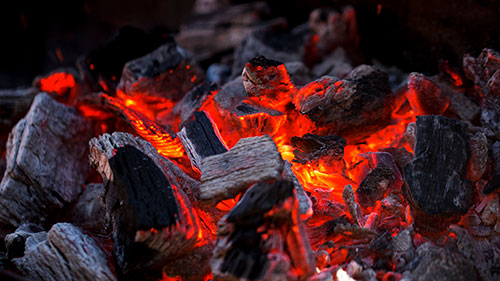 A pile of smoldering charcoal.