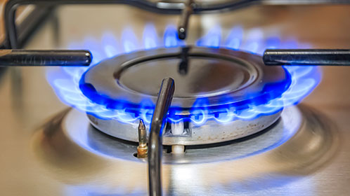 A close-up of a gas stove burner.