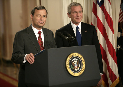 Supreme Court Justice John Roberts and President George Bush.