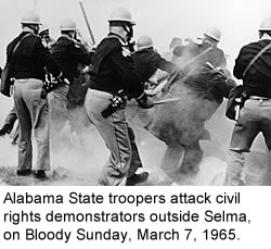 Alabama State troopers attack civil-rights demonstrators outside Selma, Alabama, on Bloody Sunday, March 7, 1965.