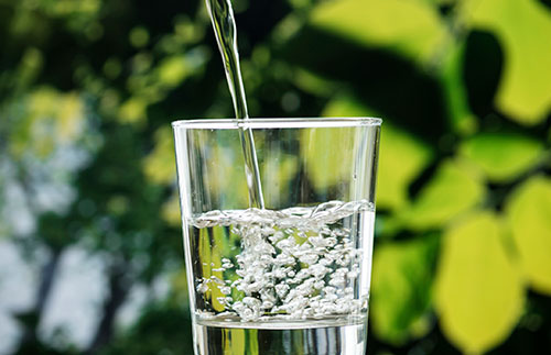 water being poured into a glass