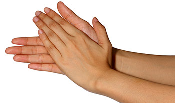 two hands rubbing together