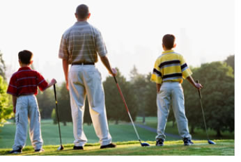 "Image of a man with his two sons playing golf."