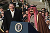 Ronald Reagan near podium with King Fahd speaking