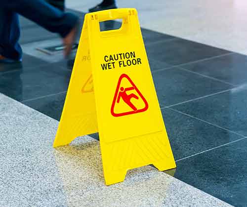 floor sign saying caution work floor